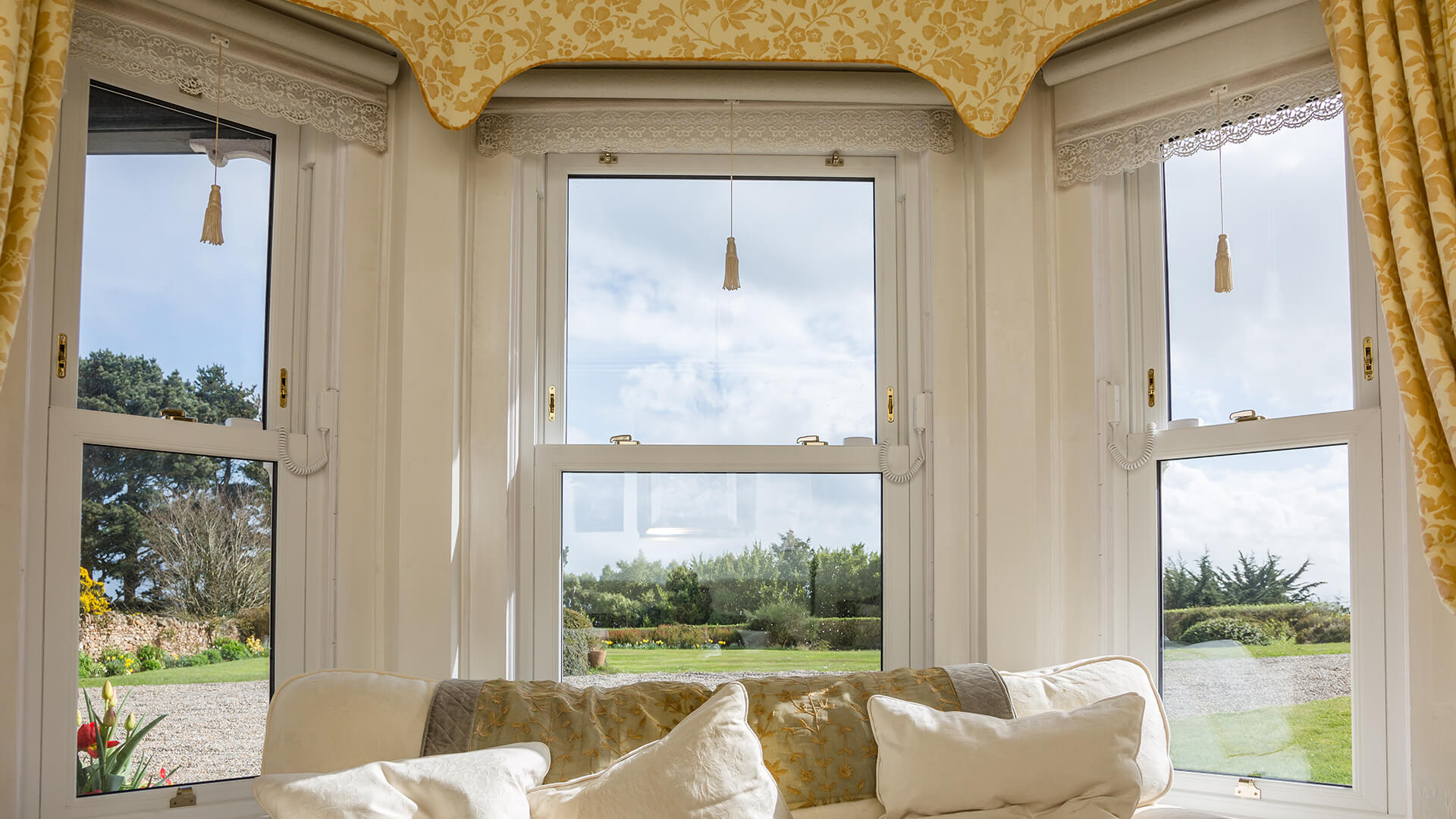 Traditional sash windows with premium iron mongery by Fairco