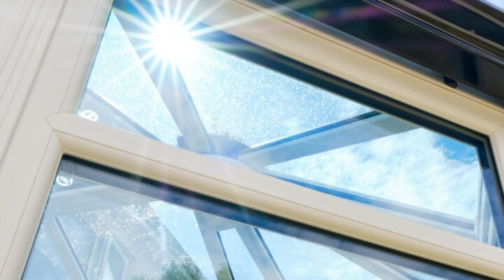 Fairco Performance uPVC window in a conservatory with sunstar shinning through 
